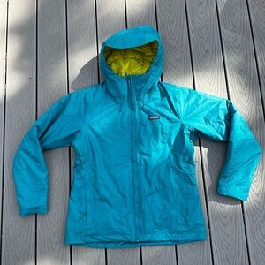 Blue Patagonia woman’s insulated torrentshell jacket. Size Large..